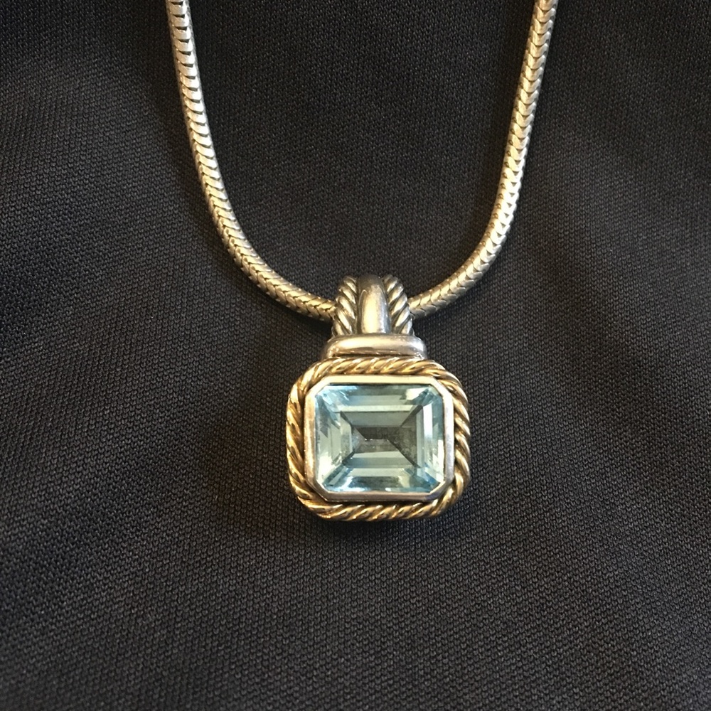 Blue Topaz gold & silver pendant 18 inch chain.